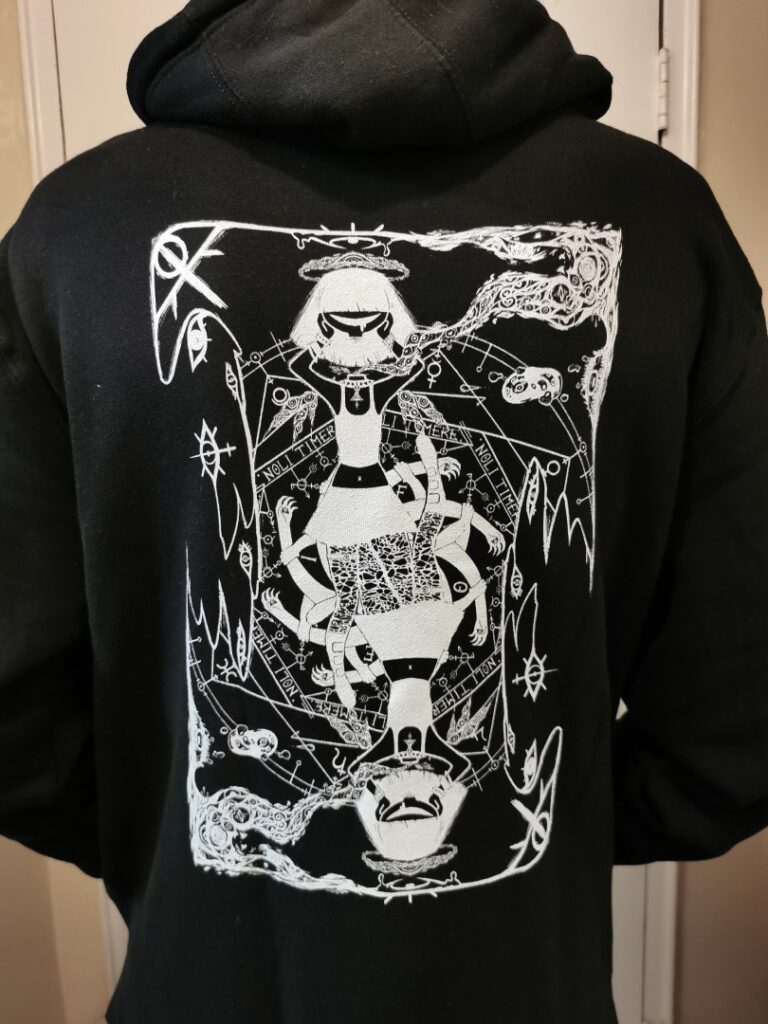 photograph of a black sweater, the aforementioned design screenprinted upon the back panel.