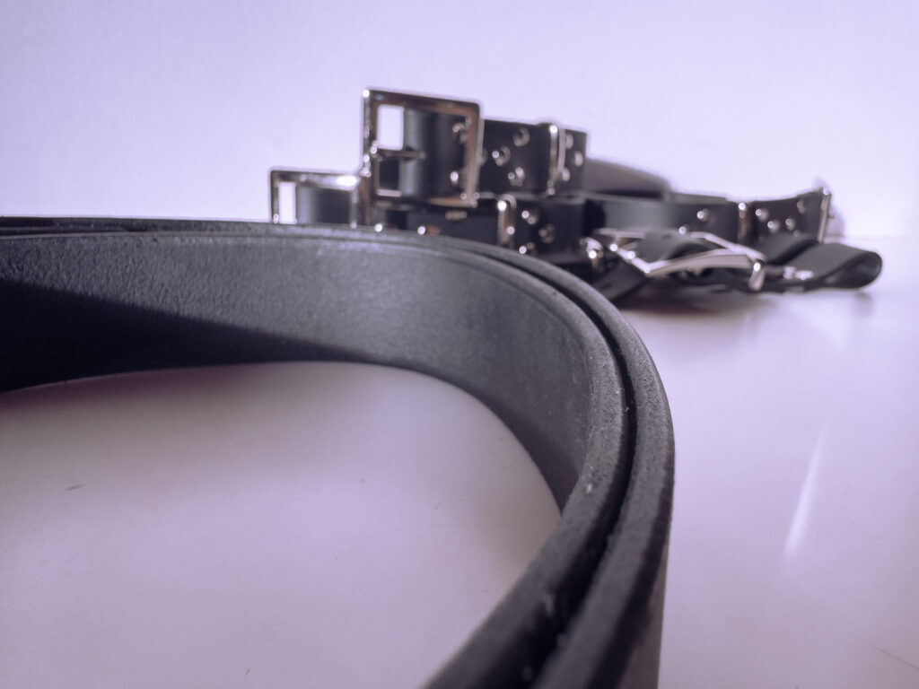 Photograph highlighting the smooth, burnished edges of the straps from the harness set.